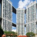 Beautiful façade view of Pinnacle@Duxton with lush greenery in the foreground