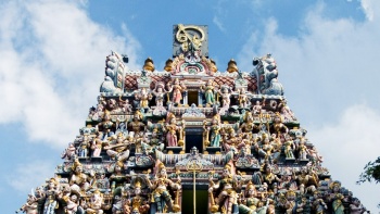 Deities adorn the roof of the Sri Veeramakaliamman Temple