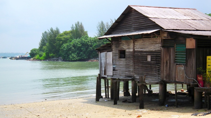 Wide shot of a <i>kampong</i> house at Pulau Ubin