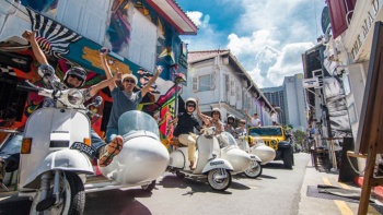 People on a vespa, Singapore Sidecars Vespa tour