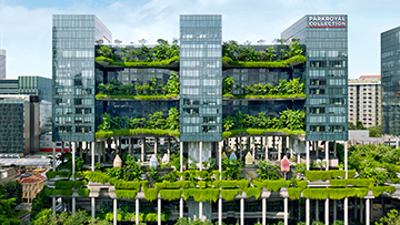 Modern PARKROYAL COLLECTION Marina Bay with vertical gardens, showcasing eco-friendly stays in Singapore