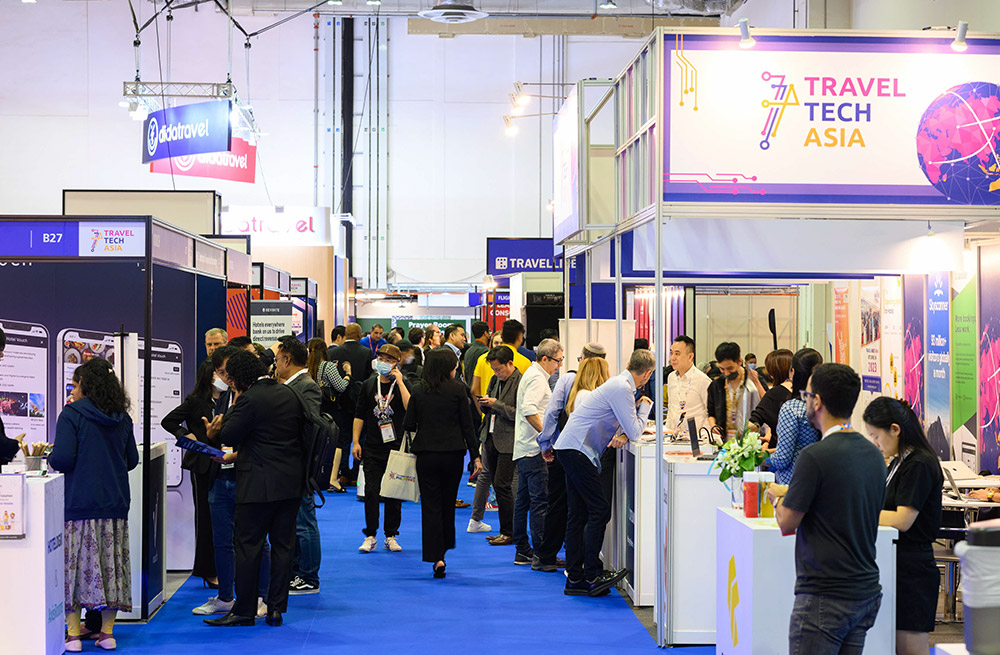 ITB Asia 2022 attendees explore travel industry booths and connect with global professionals.