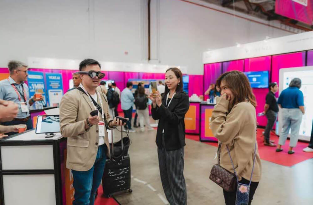 Attendee with a VR headset, testing out virtual reality shopping exeperience - a new retail innovation