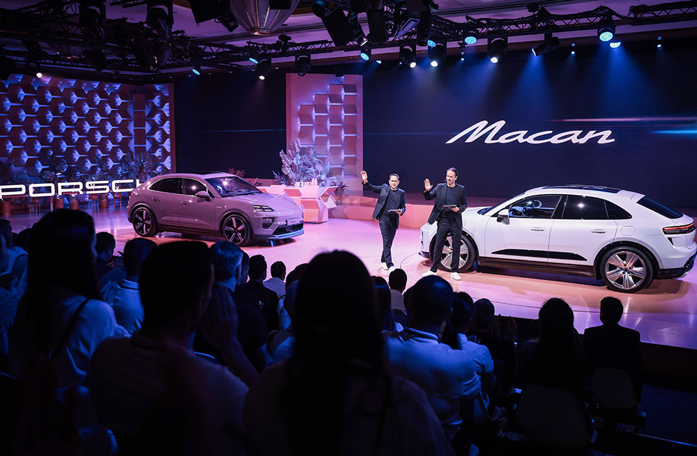 Porsche unveils the new all-electric Macan SUV to audiences at the Porsche Global Dealer Launch in Singapore.