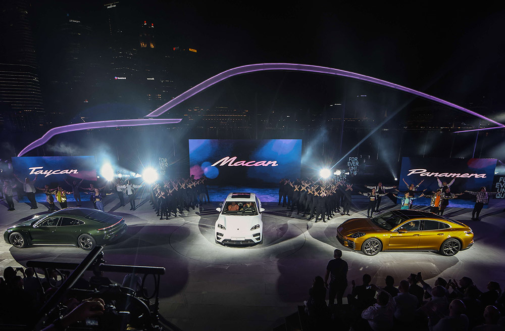 The Porsche Launch event featured a spectacular reveal of the new Macan, Taycan, and Panamera models against the stunning Marina Bay skyline