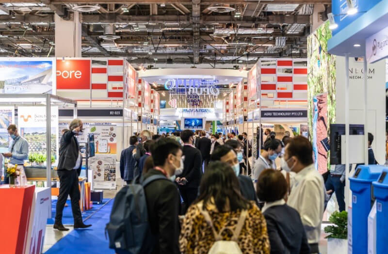 Industry professionals at SIWW 2022 networking and exploring exhibition booths on water solution.