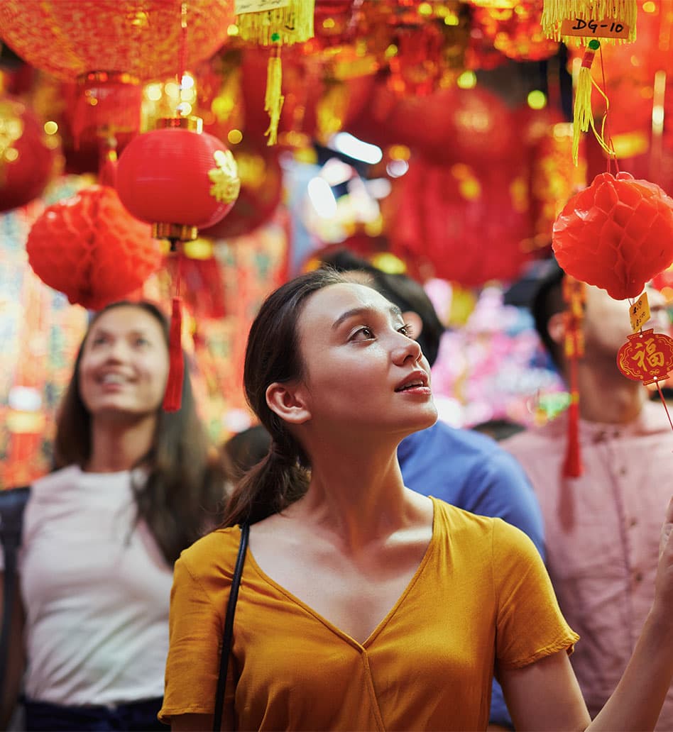 People exploring lanterns shops