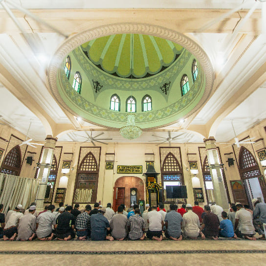 People offering prayers in Hajjah Fatima Mosque