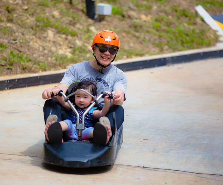 Dad & Daughter enjoying the Luge ride
