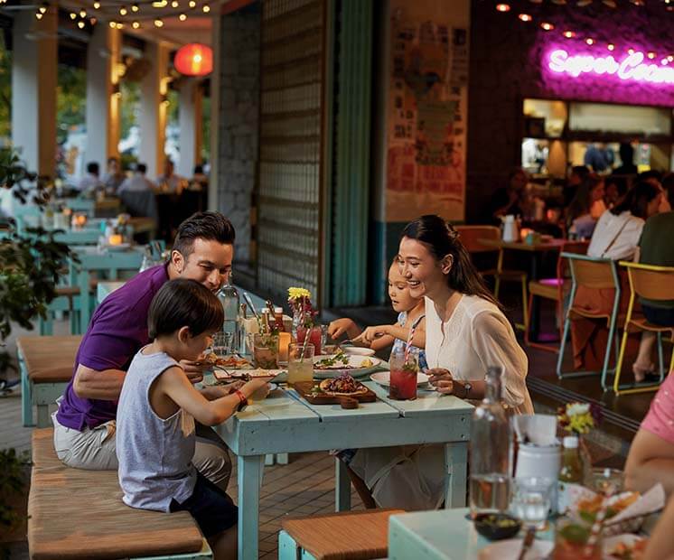 A Family enjoying dinner at a restaurant
