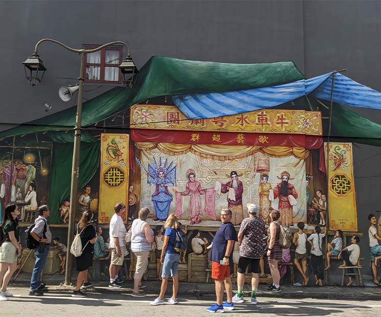 People stalking Chinese history wall paintings