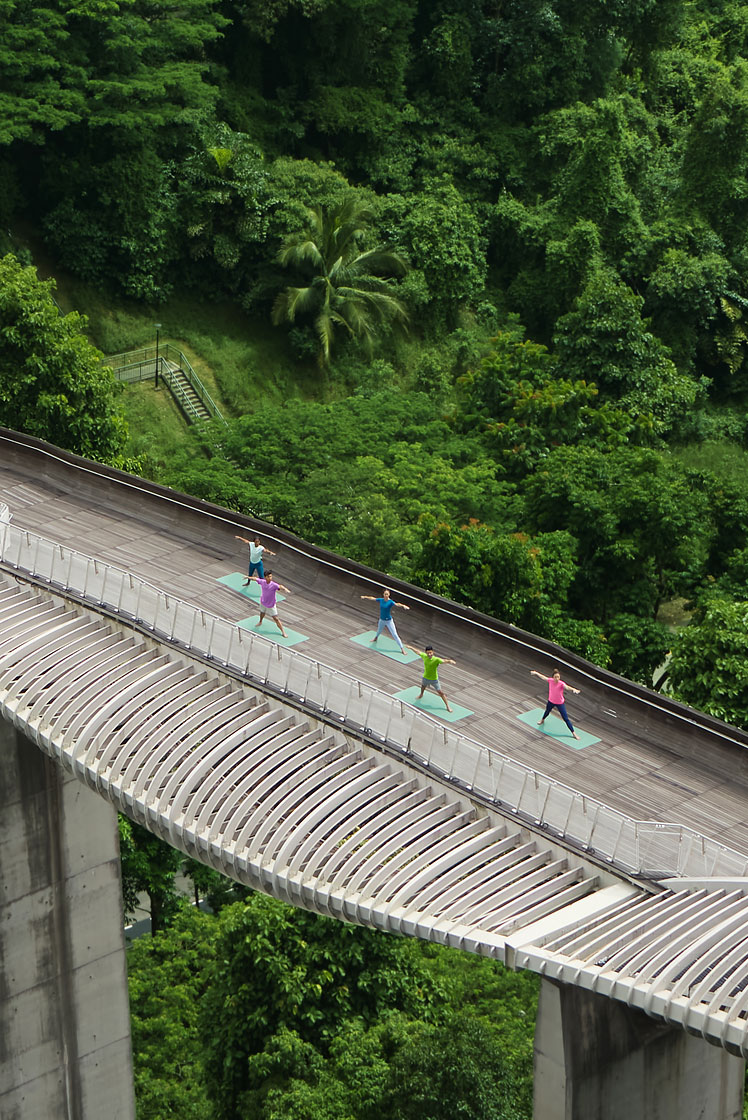 People doing Yoga exercise on Henderson Waves Bridge