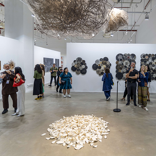 Visitors viewing contemporary art in a gallery - S.E.A Focus