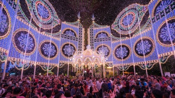 A scene at the central gazebo being lit up with fake snow at Christmas wonderland at Gardens by the Bay