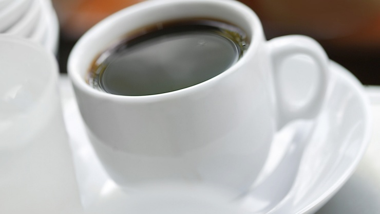 Close up image of a hot cup of <i>kopi</i> (coffee) 