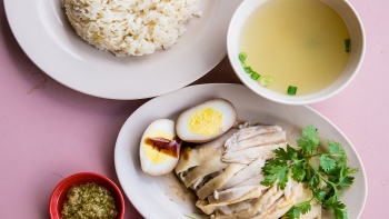 A plate of steamed chicken rice