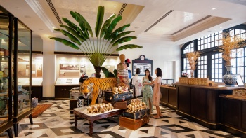 Two female shoppers at Raffles Boutique at Raffles Hotel Singapore