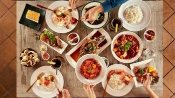 Shot of diners feasting on Eurasian cuisine at Quentin’s Eurasian Restaurant