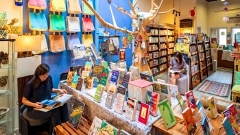Patron reading in Littered With Books, a bookstore in Duxton Hill within Chinatown