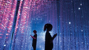 A woman and a girl at the Future World exhibition at the ArtScience Museum Singapore