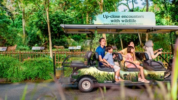 A family with a guide at the Singapore Zoo