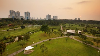 Sunset aerial view of Bishan-Ang Mo Kio Park, along the Central Urban Loop