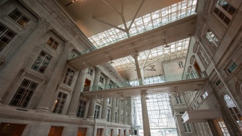 Interior ground up view of atrium of National Gallery Singapore