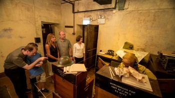 Group of visitors exploring the Battlebox museum in Fort Canning Hill