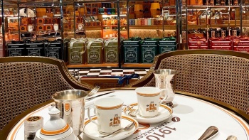 Picture of a tea set with a background of bacha coffee store 