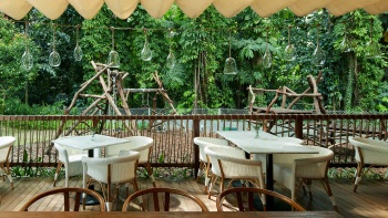 Shot of The Pantry’s outdoor seating and treehouse playground