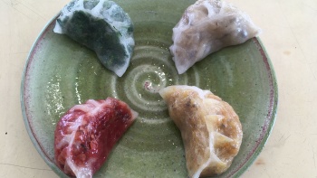 A plate of kueh in various colours from Nick Soon