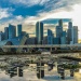 Sunset view of the Marina Bay skyline, reflected on the lotus pond outside the ArtScience museum 