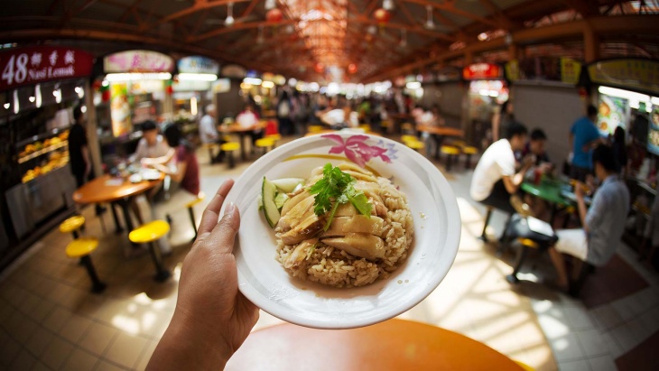 A plate of steamed chicken rice from the stalls of Maxwell Food Centre. 