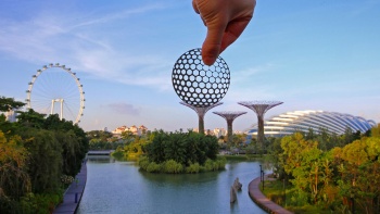 Silhouette of a golf ball on top of Gardens by the Bay. 