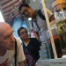 Tourist looking at exotic food ingredient in a jar along Geylang