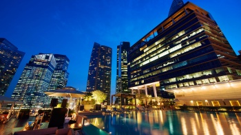 A poolside night view from Lantern at Fullerton Bay Hotel