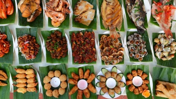 Flatlay image of variety seafood dishes
