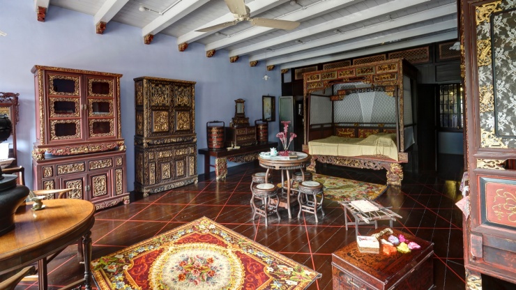 Master bedroom in the upper storey of NUS Baba House