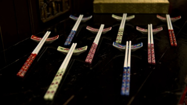 Chopsticks with Peranakan motifs and accent