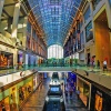 Interior shot of a symmetrical view of retail stores in Marina Bay Sands The Shoppes