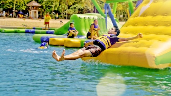a boy on a slide at Hydrodash Singapore