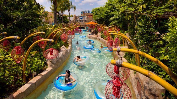 Wide shot of lazy pool at Adventure Cove Waterpark™ in Sentosa