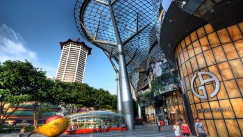 Shot of the exterior of ION Orchard with Singapore Marriott Tang Plaza Hotel in the background