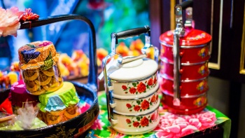 Close up shot of colourful tiffin carriers