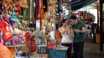 Shot of a couple shopping at Little India Arcade