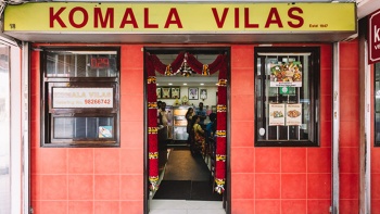 Signage and entrance of Komala Vilas