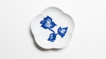 Designer porcelain plate with flowers taken on a white background at Supermama Bras Basah Bugis