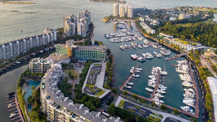 Drone shot of restaurants and yachts in Quayside Isle
