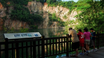 A family enjoying the view at Little Guilin at Bukit Timah Nature Reserve