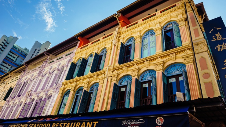 A row of colourful shophouses in Chinatown